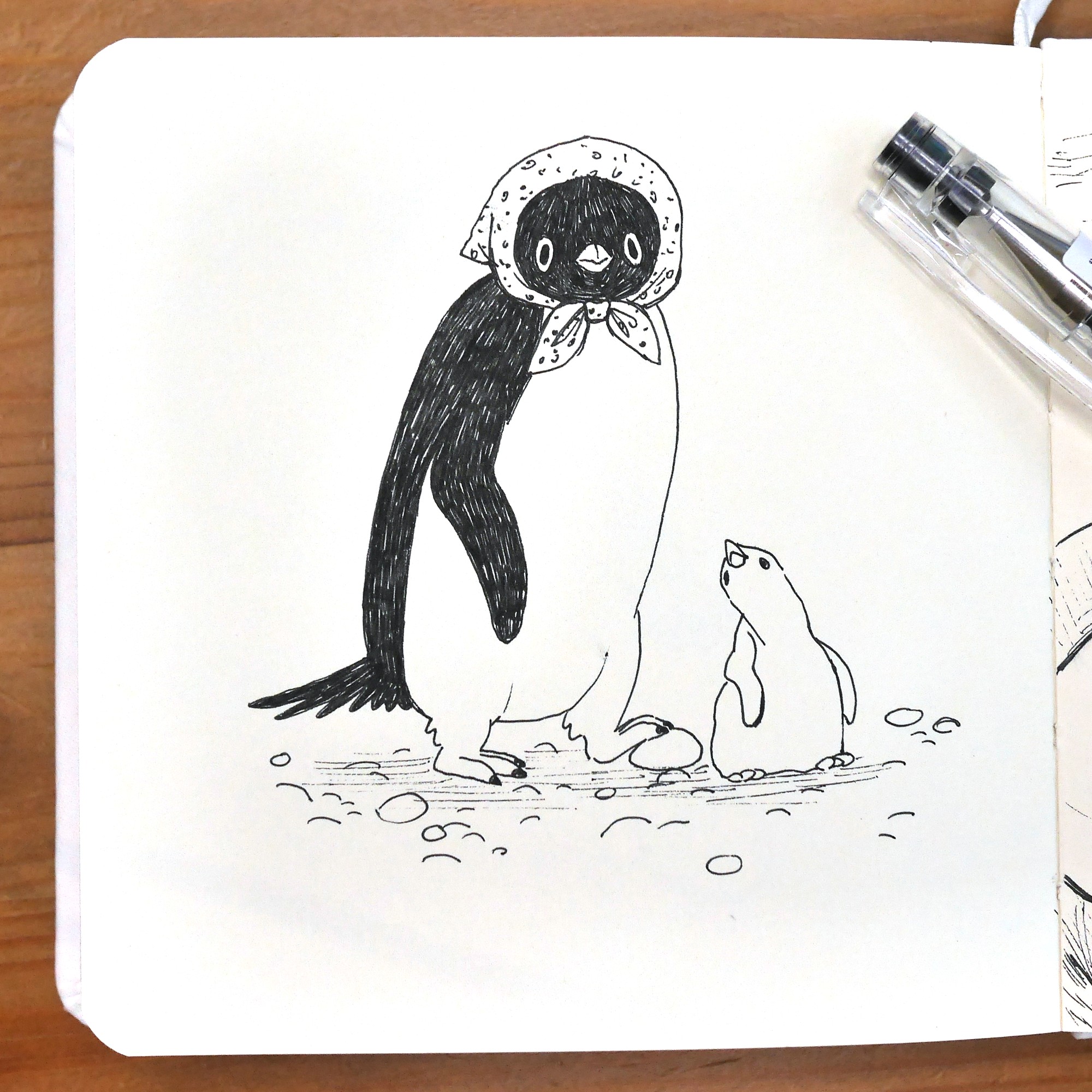 A pen drawing of an adult adelie penguin in a slavic headscarf standing next to a little chick.