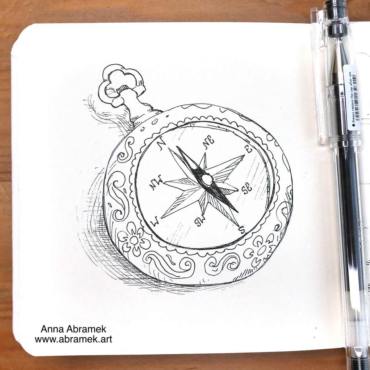 A pen drawing of an ornate pocket compass.